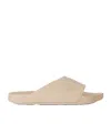 Givenchy Label Slide Mules In Rubber In Neutral