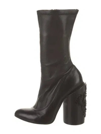 Pre-owned Givenchy Leather Animal Print Boots In Black