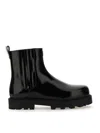 Givenchy Streamlined Leather Ankle Boots In Black