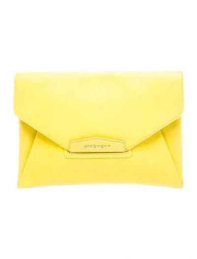Pre-owned Givenchy Leather Clutch In Yellow