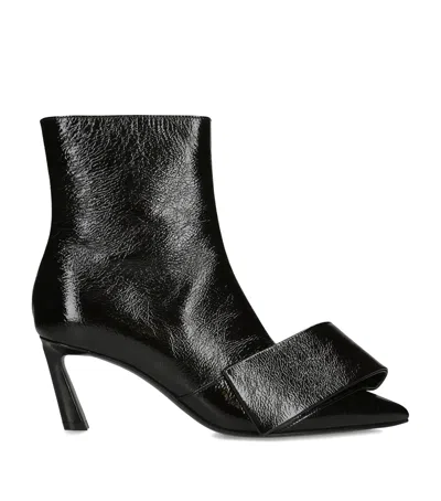 Givenchy Leather Twisted Ribbon Ankle Boots 65 In Black