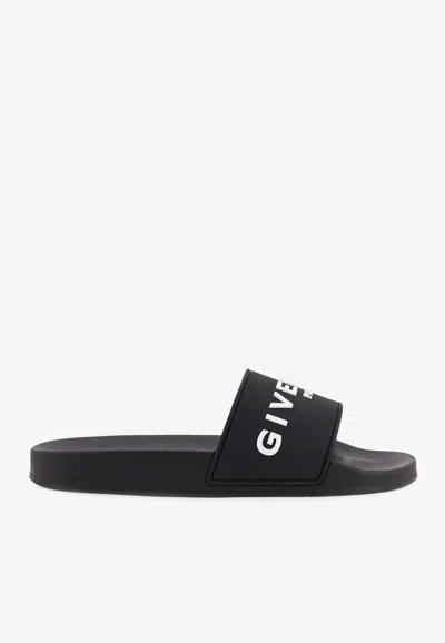 Givenchy Logo Embossed Rubber Slides In Black