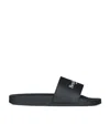 Givenchy Logo Embossed Sandals In Black