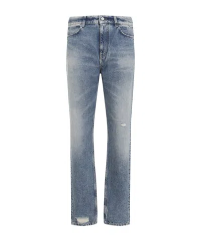 GIVENCHY GIVENCHY LOGO EMBROIDERED DISTRESSED JEANS