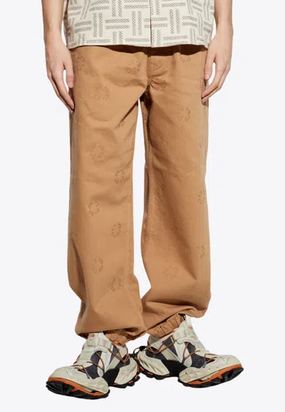 Givenchy Logo Embroidered Track Pants In Beige