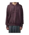 Givenchy Logo Embossed Drawstring Hoodie In Black