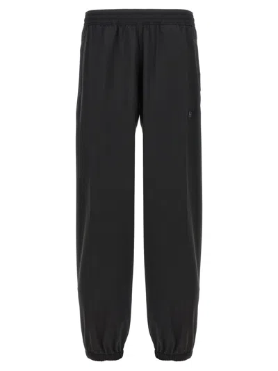 Givenchy Logo Elastic Waistband Pants With Pockets In Black