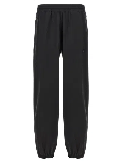 Givenchy Logo Elastic Waistband Pants With Pockets In Black