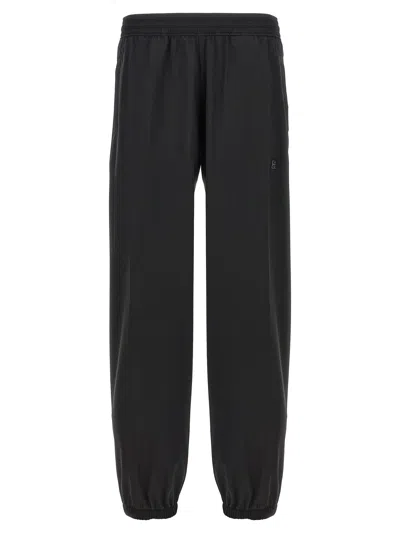 Givenchy Logo Elastic Waistband Pants With Pockets In Black