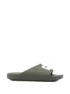 Givenchy Label Slide Flat Mules In Rubber In Green