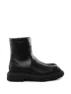 Givenchy Logo-embossed Leather Boots In Black