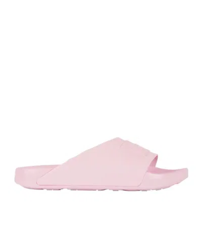 GIVENCHY LABEL SLIDE FLAT MULES IN PATENT RUBBER