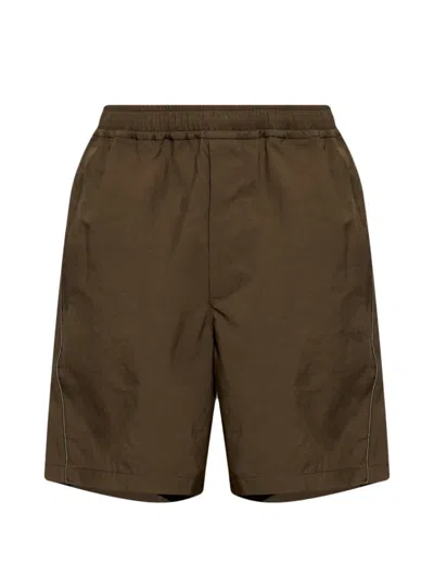 Givenchy Back And Side Pocket Shorts In Green