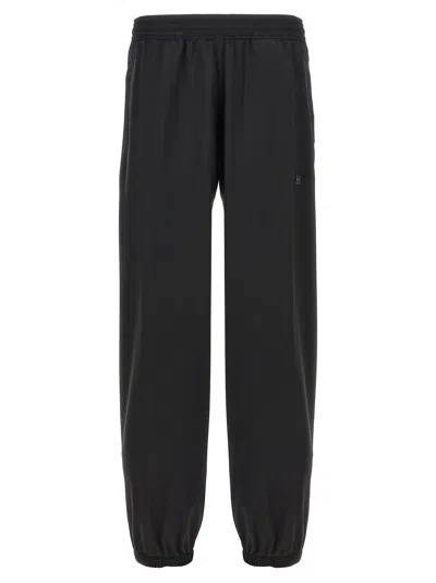 Givenchy Logo-embroidered Wool Joggers In Black