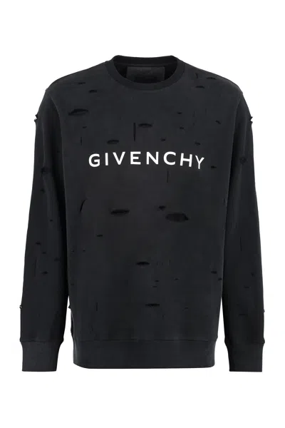 Givenchy Logo-printed Distressed Cotton Sweatshirt In Black
