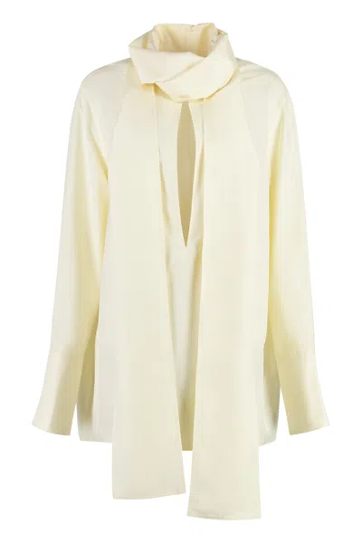 Givenchy Luxurious Silk Blouse With A Feminine Pussy-bow Collar In Panna