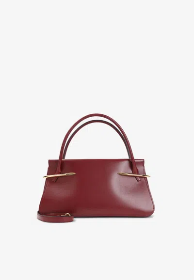 Givenchy Medium Pinch Leather Shoulder Bag In Burgundy
