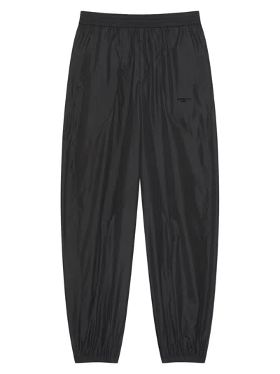 Givenchy Pantalon De Jogging Couture Seam À Découpes Mix Matières In Black