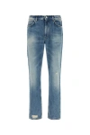 Givenchy Washed Denim Tapered Leg Jeans With Contrast Stitching In Blue