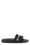 Givenchy Logo Embossed Rubber Slides In Black
