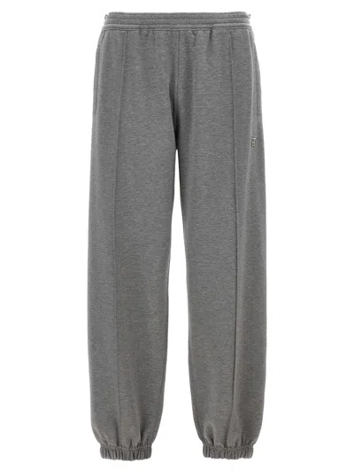 Givenchy Metallic Logo Joggers In Gray