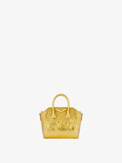 Givenchy Micro Antigona Bag In Laminated Leather In Gold