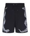 Givenchy Monster Print Shorts In Black