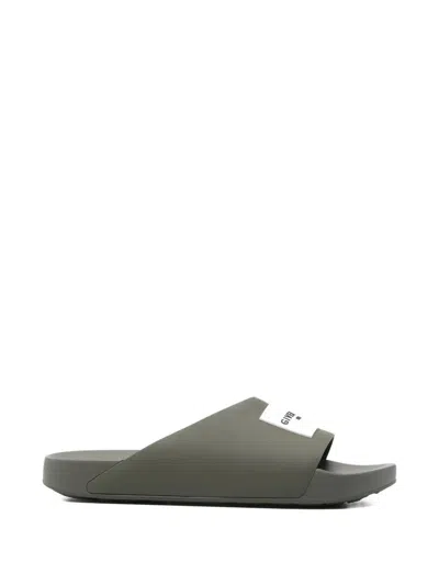 GIVENCHY LABEL SLIDE FLAT MULES IN RUBBER
