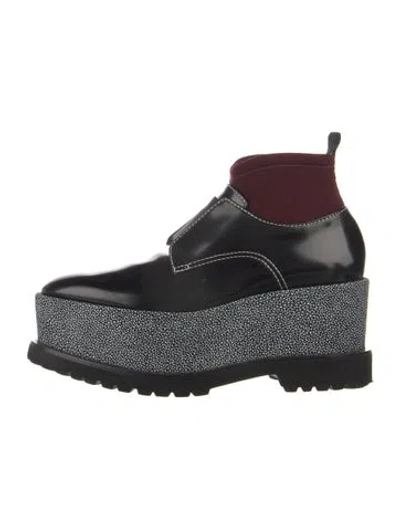 Pre-owned Givenchy Patent Leather Boots In Black