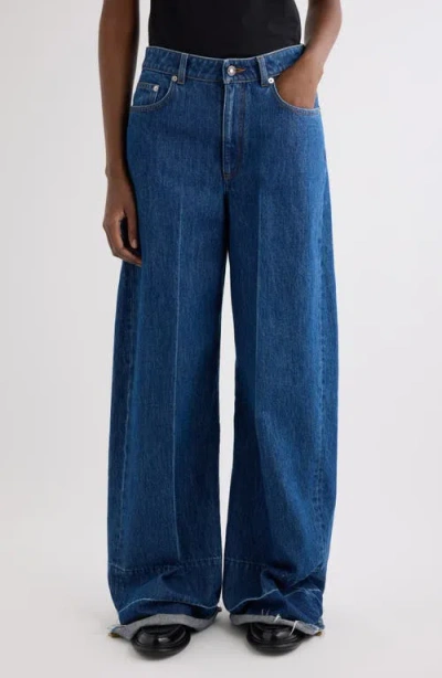 Givenchy Raw Edge Wide Leg Denim Jeans In Blue