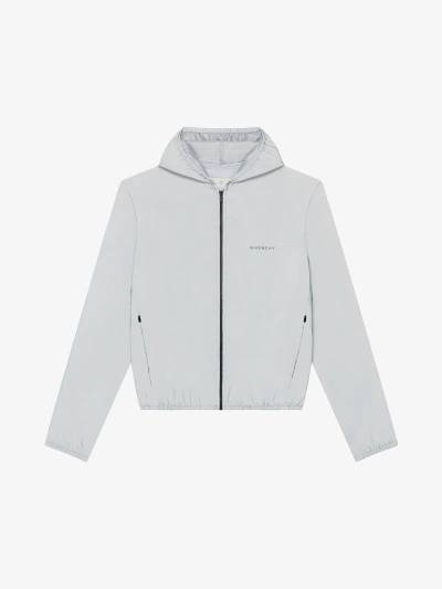 Givenchy Reflective Hooded Windreaker In Light Blue
