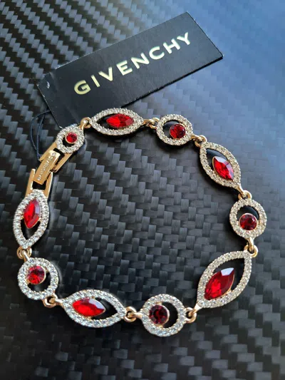 Pre-owned Givenchy Ruby Halo Eye Crystal Gold Bracelet