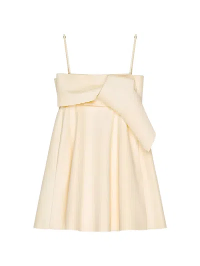 Givenchy Sliced Mini Dress In Nappa Leather With Bow In Neutrals