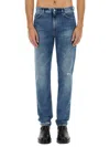 Givenchy Washed Denim Tapered Leg Jeans With Contrast Stitching