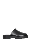 Givenchy Logo Plaque Block-heel Mules In Black