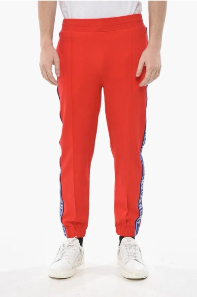 Givenchy Stretch Fabric Joggers With Logo Side Bands In Orange