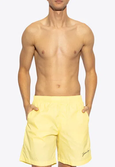 GIVENCHY SWIM SHORTS WITH LOGO SIGNATURE