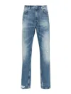 Givenchy Washed Denim Tapered Leg Jeans With Contrast Stitching In Blue