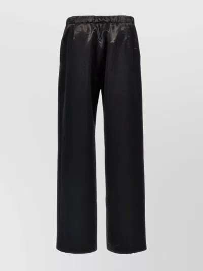 GIVENCHY TROUSERS FEATURING ELASTIC WAISTBAND AND WIDE LEG