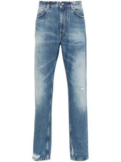 Givenchy Washed Denim Tapered Leg Jeans With Contrast Stitching In Blue