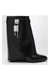 Givenchy Shark Lock Biker Ankle Boots In Leather And Shearling