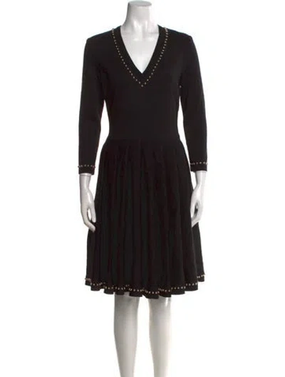 Pre-owned Givenchy Wool Knee-length Dress In Black