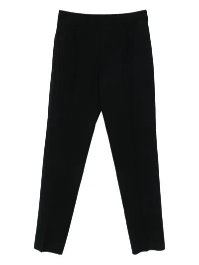 Givenchy Wool Pleated-front Trousers In Black