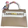 Glam Collections Glam Signature Mini Purse In Brown