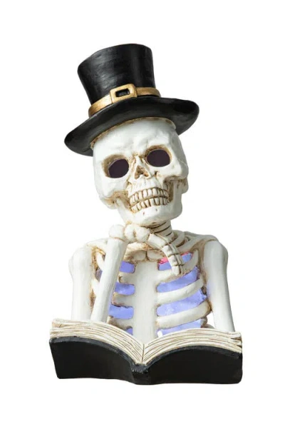 Glitzhome 10.25"h Halloween Lighted Resin Skull Reading Book Table Decor In White