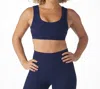 Glyder Notch Sports Bra In Indigo Swirl Gloss In Blue