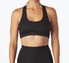 Glyder Notch Sports Bra In Black Swirl Gloss In Black