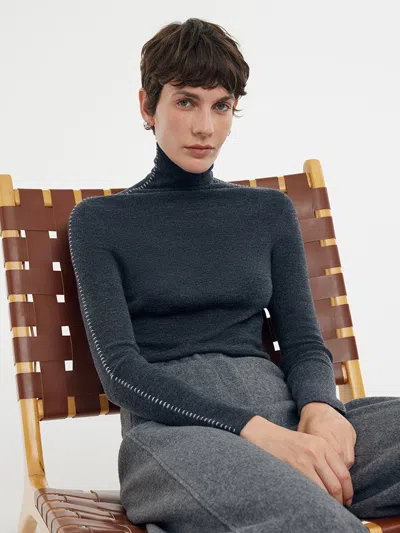Goelia Machine Washable Wool Turtleneck Women Knit Top In Animal Print