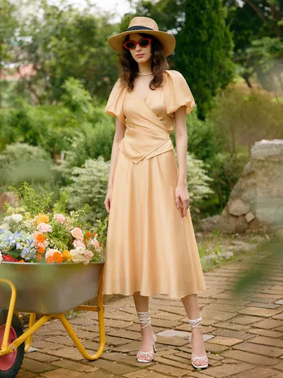 Goelia Puff Sleeves Wrapped Top And Skirt With Bottomed Camisole Three-piece Set In Gold
