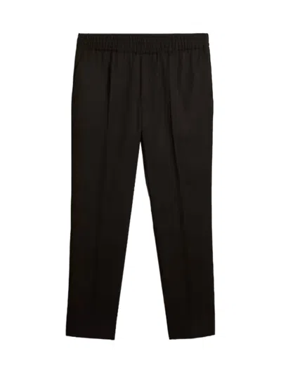 Golden Goose Logo-plaque Virgin Wool Trousers In Black